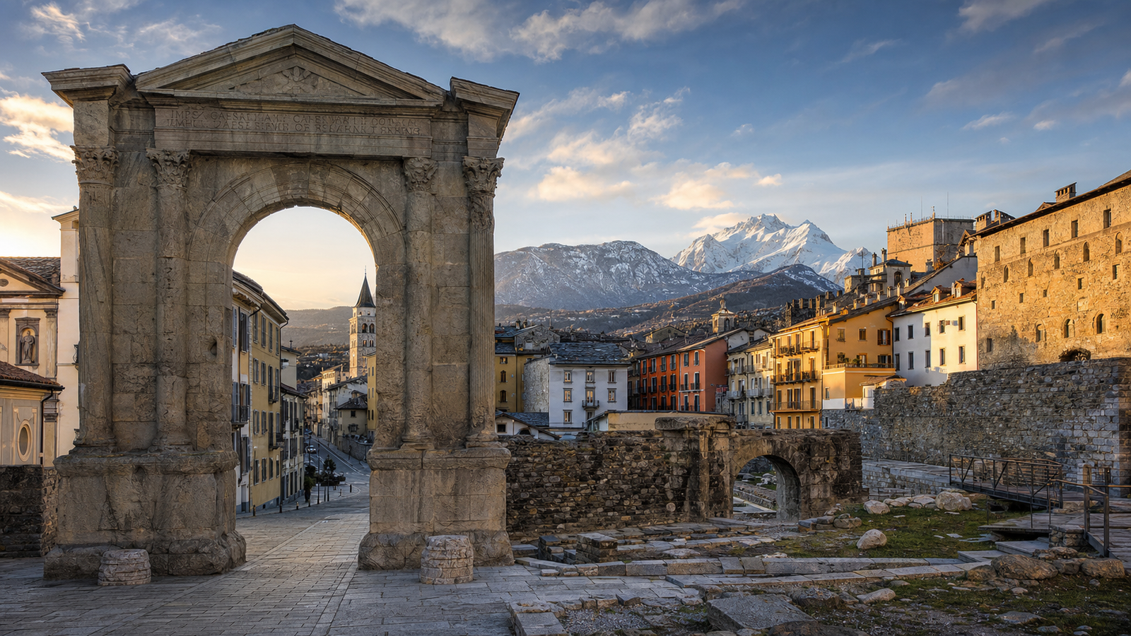 Aosta in solitaria: arrivo treno, Arco d’Augusto, Teatro Romano, Sant’Orso, castelli e fontina — guida senza auto nella capitale delle Alpi