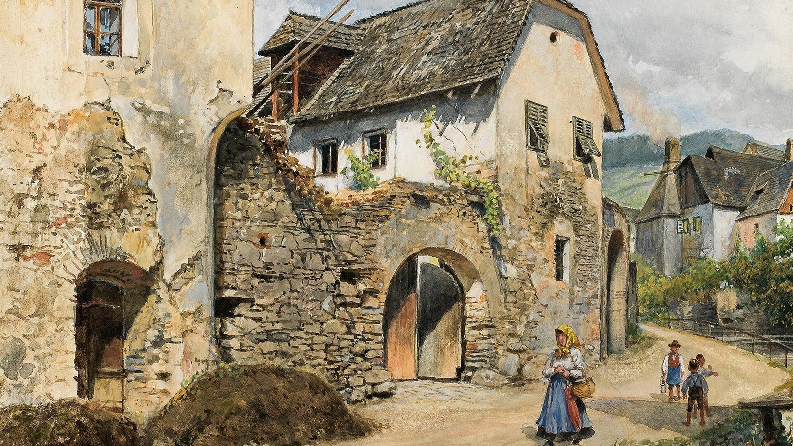 Weissenkirchen in der Wachau village on the Danube with the white fortified Gothic church and terraced vineyards
