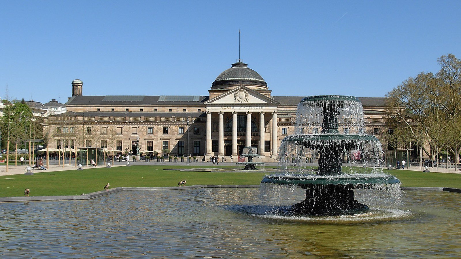 Kurhaus neoclassical building and fountain of Wiesbaden at golden hour